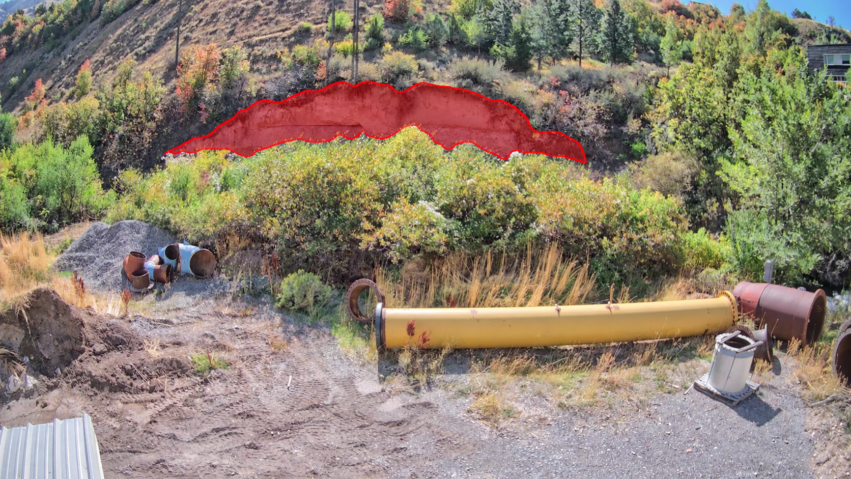 Annotated landslide area highlighted on a hillside image
